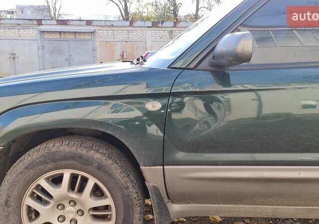 Зеленый Субару Форестер, объемом двигателя 2 л и пробегом 260 тыс. км за 5700 $, фото 2 на Automoto.ua