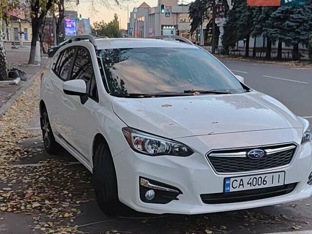 Белый Субару Импреза, объемом двигателя 2 л и пробегом 94 тыс. км за 15000 $, фото 1 на Automoto.ua
