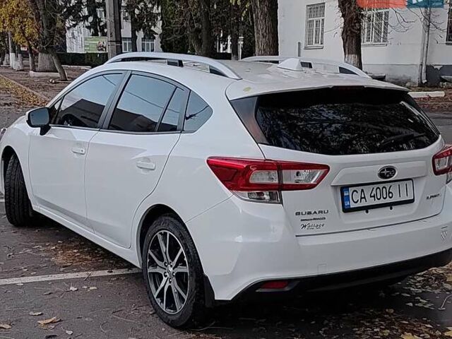 Белый Субару Импреза, объемом двигателя 2 л и пробегом 94 тыс. км за 15000 $, фото 3 на Automoto.ua