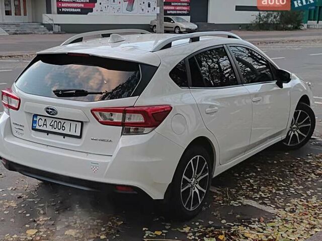 Белый Субару Импреза, объемом двигателя 2 л и пробегом 94 тыс. км за 15000 $, фото 2 на Automoto.ua