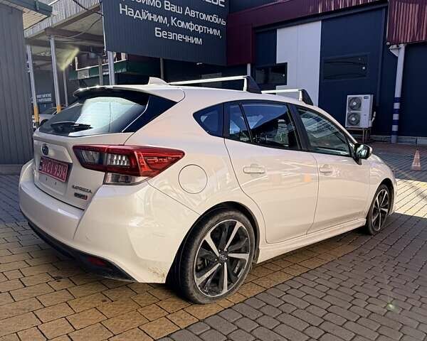 Белый Субару Импреза, объемом двигателя 2 л и пробегом 84 тыс. км за 12500 $, фото 6 на Automoto.ua