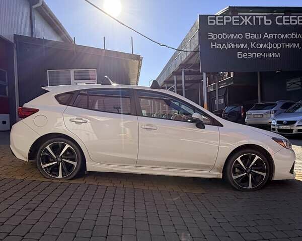 Белый Субару Импреза, объемом двигателя 2 л и пробегом 84 тыс. км за 12500 $, фото 7 на Automoto.ua