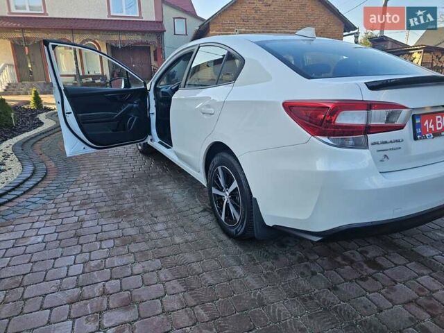 Белый Субару Импреза, объемом двигателя 2 л и пробегом 56 тыс. км за 13800 $, фото 16 на Automoto.ua