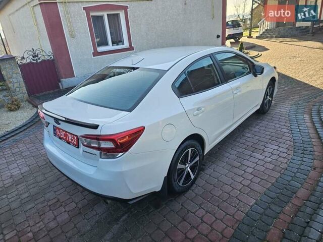 Белый Субару Импреза, объемом двигателя 2 л и пробегом 56 тыс. км за 13800 $, фото 7 на Automoto.ua