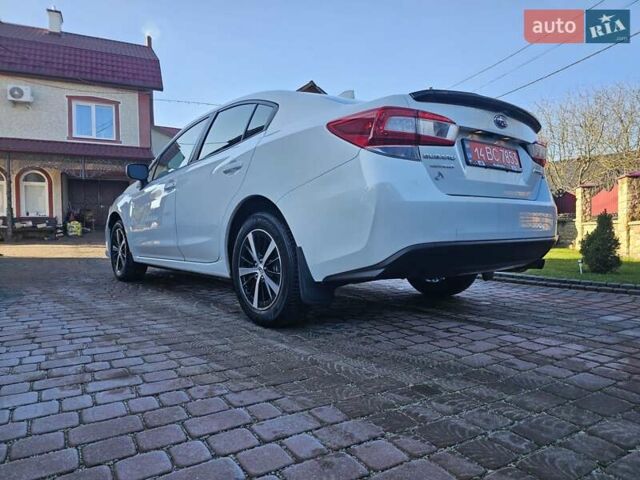 Белый Субару Импреза, объемом двигателя 2 л и пробегом 56 тыс. км за 13800 $, фото 6 на Automoto.ua