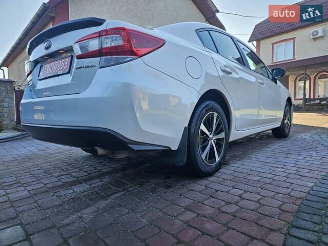 Белый Субару Импреза, объемом двигателя 2 л и пробегом 56 тыс. км за 13800 $, фото 9 на Automoto.ua