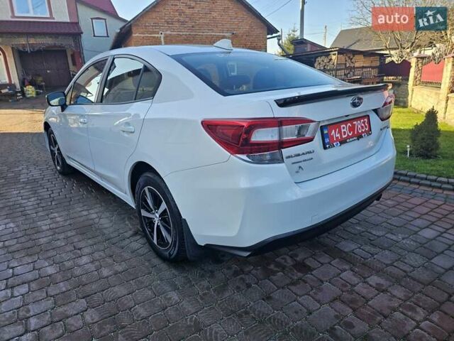 Белый Субару Импреза, объемом двигателя 2 л и пробегом 56 тыс. км за 13800 $, фото 12 на Automoto.ua