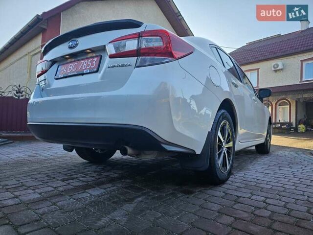 Белый Субару Импреза, объемом двигателя 2 л и пробегом 56 тыс. км за 13800 $, фото 20 на Automoto.ua