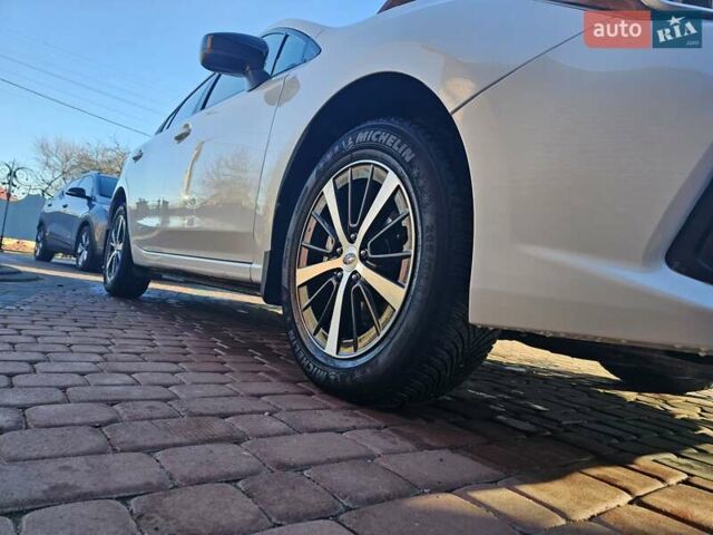 Белый Субару Импреза, объемом двигателя 2 л и пробегом 56 тыс. км за 13800 $, фото 19 на Automoto.ua