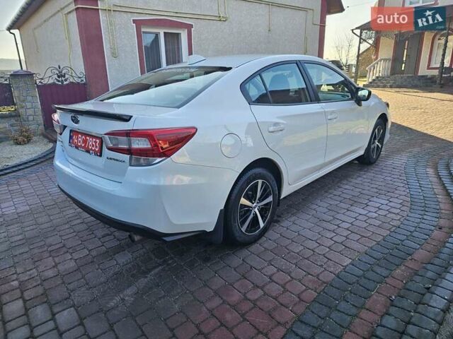 Белый Субару Импреза, объемом двигателя 2 л и пробегом 56 тыс. км за 13800 $, фото 10 на Automoto.ua