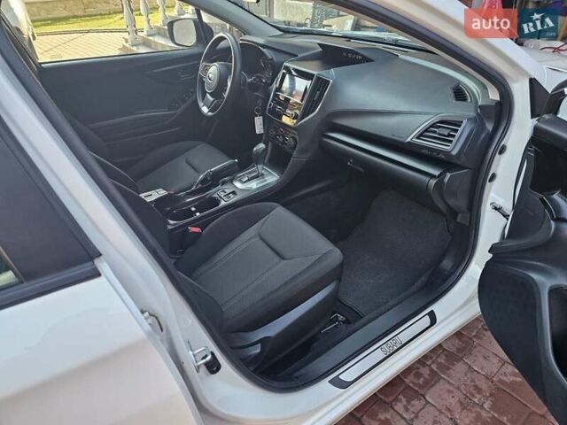 Белый Субару Импреза, объемом двигателя 2 л и пробегом 56 тыс. км за 13800 $, фото 24 на Automoto.ua