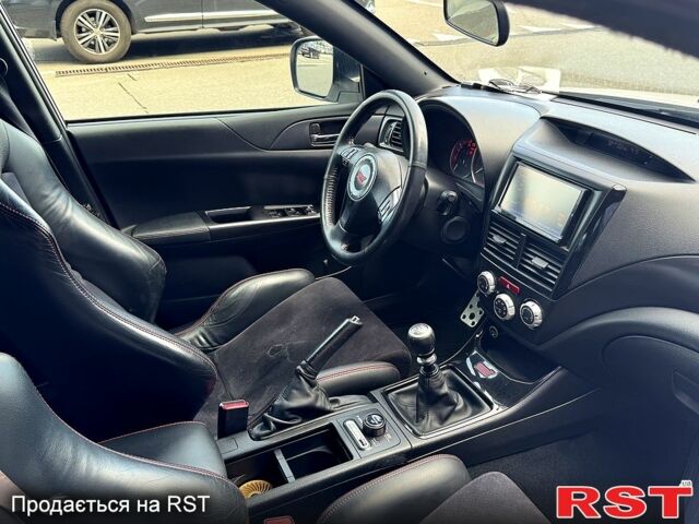 Белый Субару Импреза, объемом двигателя 2.5 л и пробегом 142 тыс. км за 16000 $, фото 5 на Automoto.ua