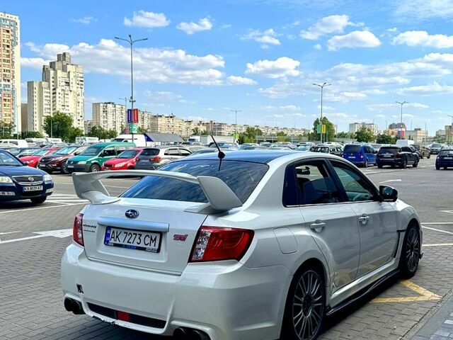 Белый Субару Импреза, объемом двигателя 2.5 л и пробегом 142 тыс. км за 16000 $, фото 3 на Automoto.ua