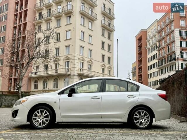 Белый Субару Импреза, объемом двигателя 2 л и пробегом 157 тыс. км за 7700 $, фото 61 на Automoto.ua