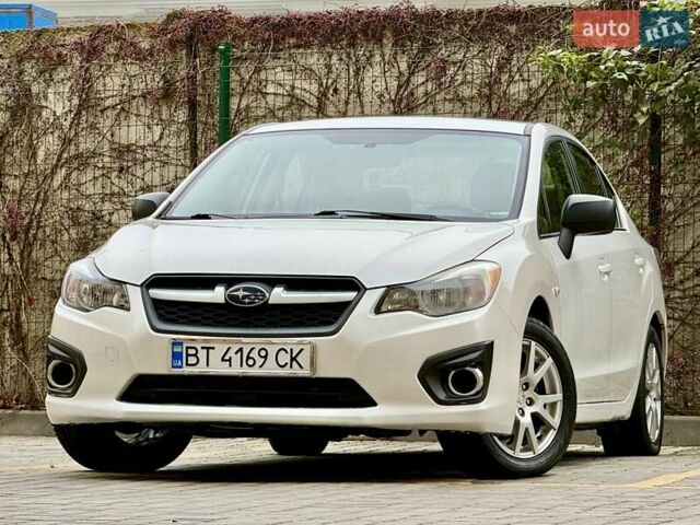 Белый Субару Импреза, объемом двигателя 2 л и пробегом 157 тыс. км за 7700 $, фото 3 на Automoto.ua