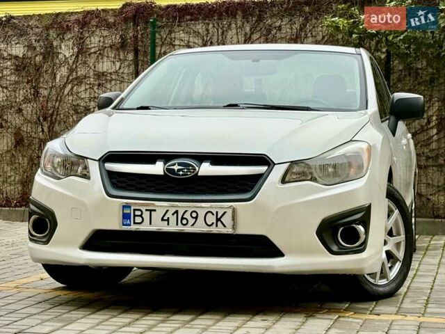 Белый Субару Импреза, объемом двигателя 2 л и пробегом 157 тыс. км за 7700 $, фото 5 на Automoto.ua