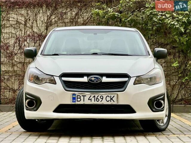Белый Субару Импреза, объемом двигателя 2 л и пробегом 157 тыс. км за 7700 $, фото 1 на Automoto.ua