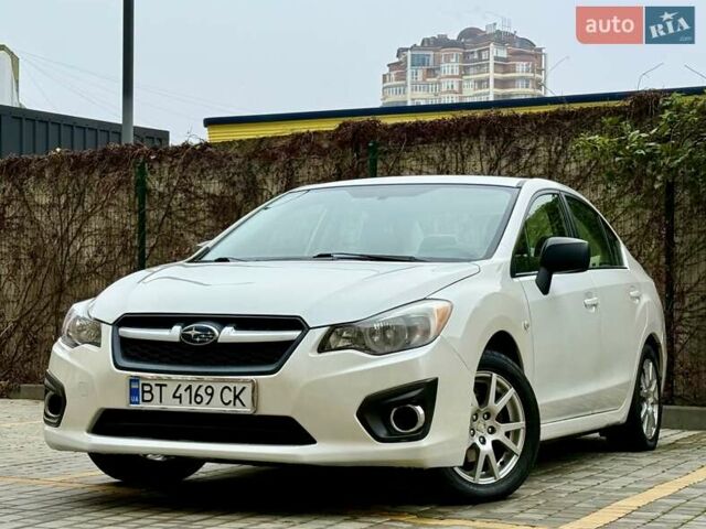 Белый Субару Импреза, объемом двигателя 2 л и пробегом 157 тыс. км за 7700 $, фото 4 на Automoto.ua