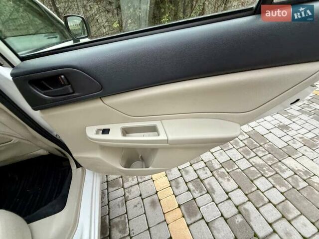 Белый Субару Импреза, объемом двигателя 2 л и пробегом 157 тыс. км за 7700 $, фото 30 на Automoto.ua