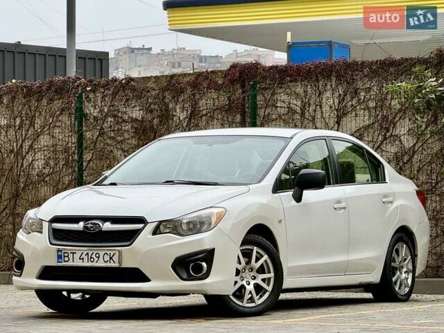Белый Субару Импреза, объемом двигателя 2 л и пробегом 157 тыс. км за 7700 $, фото 2 на Automoto.ua