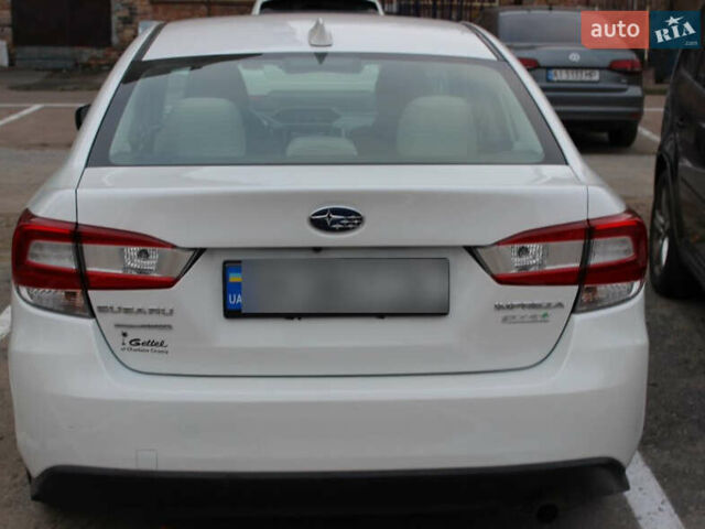 Белый Субару Импреза, объемом двигателя 2 л и пробегом 107 тыс. км за 11000 $, фото 2 на Automoto.ua