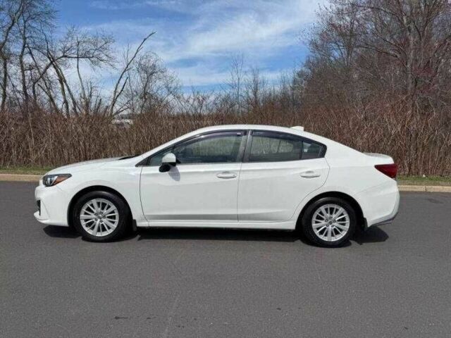 Белый Субару Импреза, объемом двигателя 2 л и пробегом 145 тыс. км за 2100 $, фото 1 на Automoto.ua