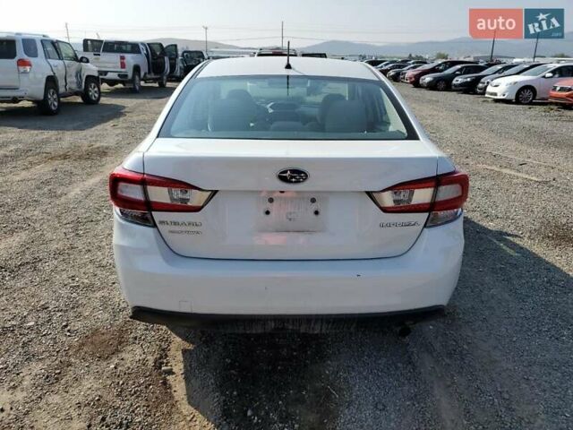 Белый Субару Импреза, объемом двигателя 2 л и пробегом 74 тыс. км за 2400 $, фото 5 на Automoto.ua