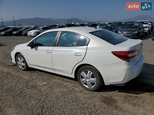 Белый Субару Импреза, объемом двигателя 2 л и пробегом 74 тыс. км за 2400 $, фото 1 на Automoto.ua