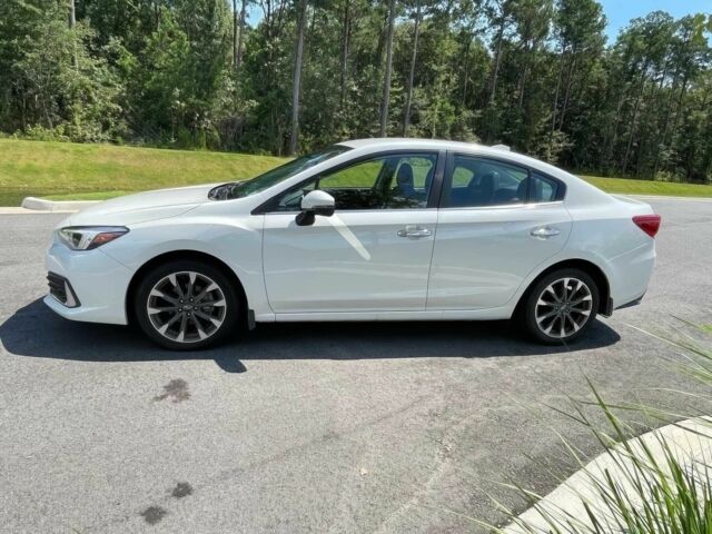 Белый Субару Импреза, объемом двигателя 2 л и пробегом 39 тыс. км за 3400 $, фото 1 на Automoto.ua