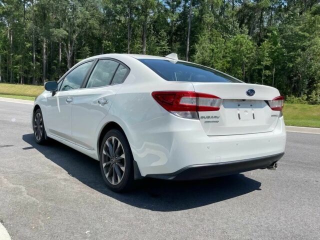 Белый Субару Импреза, объемом двигателя 2 л и пробегом 39 тыс. км за 3400 $, фото 2 на Automoto.ua