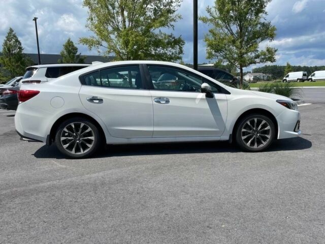 Белый Субару Импреза, объемом двигателя 2 л и пробегом 39 тыс. км за 3400 $, фото 5 на Automoto.ua