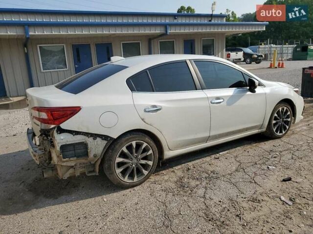 Белый Субару Импреза, объемом двигателя 2 л и пробегом 81 тыс. км за 2400 $, фото 2 на Automoto.ua