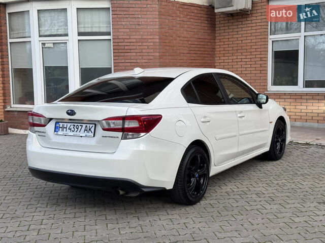 Белый Субару Импреза, объемом двигателя 2 л и пробегом 128 тыс. км за 12960 $, фото 6 на Automoto.ua