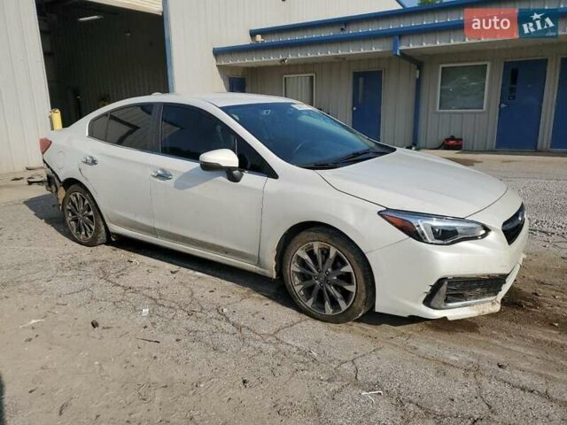 Белый Субару Импреза, объемом двигателя 2 л и пробегом 81 тыс. км за 2400 $, фото 3 на Automoto.ua