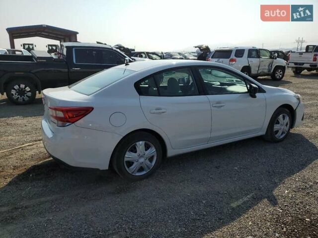 Белый Субару Импреза, объемом двигателя 2 л и пробегом 74 тыс. км за 2400 $, фото 2 на Automoto.ua