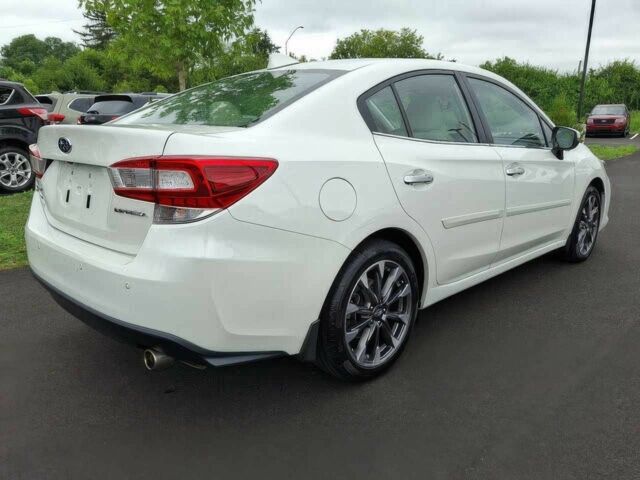 Білий Субару Імпреза, об'ємом двигуна 2 л та пробігом 24 тис. км за 10200 $, фото 3 на Automoto.ua