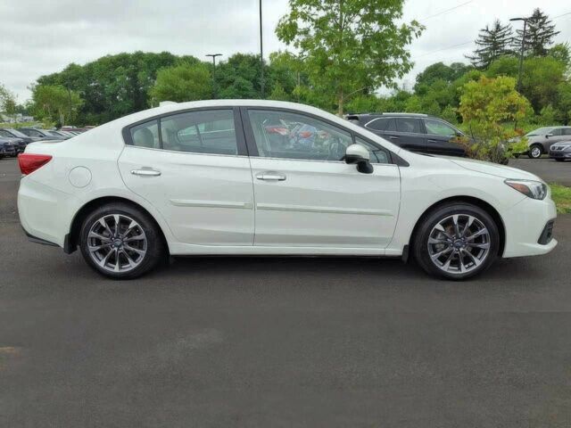 Білий Субару Імпреза, об'ємом двигуна 2 л та пробігом 24 тис. км за 10200 $, фото 2 на Automoto.ua