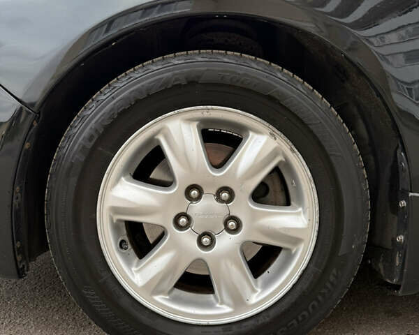 Черный Субару Импреза, объемом двигателя 1.5 л и пробегом 261 тыс. км за 5450 $, фото 12 на Automoto.ua