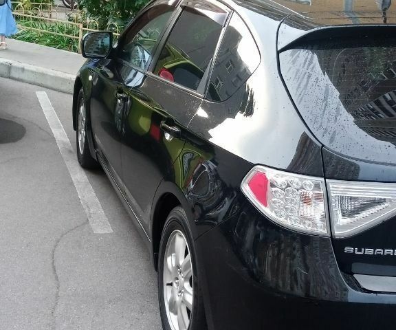 Черный Субару Импреза, объемом двигателя 1.5 л и пробегом 235 тыс. км за 5000 $, фото 1 на Automoto.ua