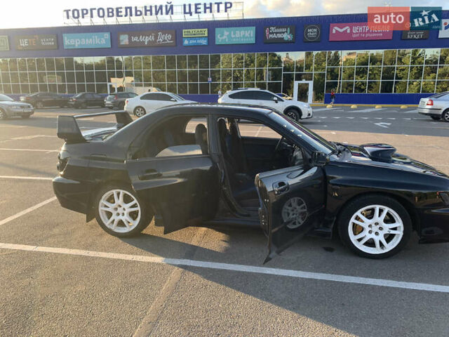 Чорний Субару Імпреза, об'ємом двигуна 2 л та пробігом 153 тис. км за 12000 $, фото 5 на Automoto.ua