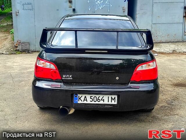 Черный Субару Импреза, объемом двигателя 2 л и пробегом 150 тыс. км за 8900 $, фото 1 на Automoto.ua