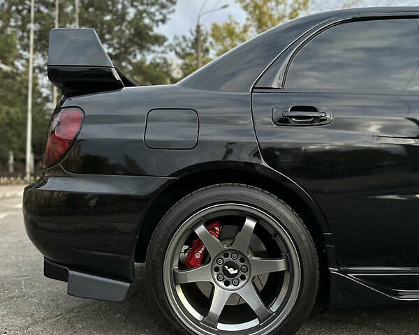 Субару Импреза 2004 в Николаеве на Automoto.ua Черный Субару Импреза, объемом двигателя 1.99 л и пробегом 225 тыс. км за 14300 $, фото 10 на Automoto.ua