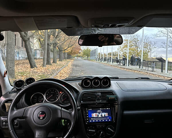 Субару Импреза 2004 в Николаеве на Automoto.ua Черный Субару Импреза, объемом двигателя 1.99 л и пробегом 225 тыс. км за 14300 $, фото 12 на Automoto.ua