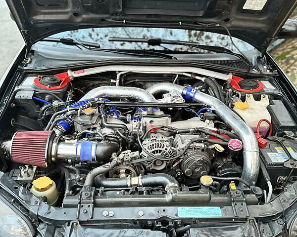 Субару Импреза 2004 в Николаеве на Automoto.ua Черный Субару Импреза, объемом двигателя 1.99 л и пробегом 225 тыс. км за 14300 $, фото 15 на Automoto.ua