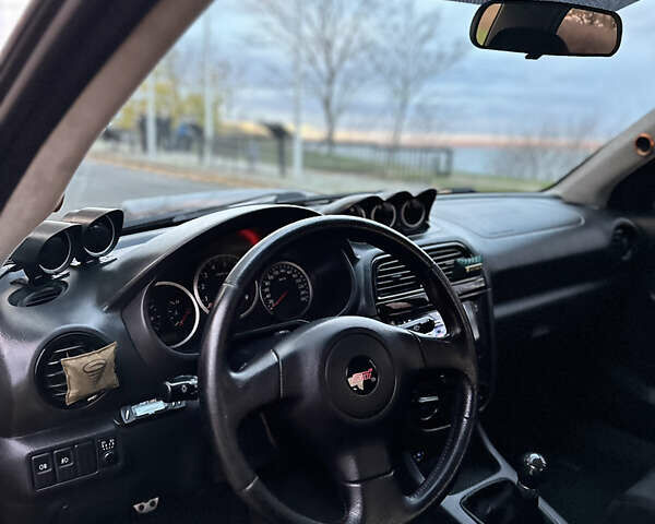 Субару Импреза 2004 в Николаеве на Automoto.ua Черный Субару Импреза, объемом двигателя 1.99 л и пробегом 225 тыс. км за 14300 $, фото 11 на Automoto.ua