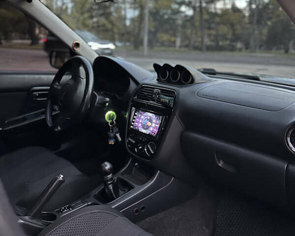 Субару Импреза 2004 в Николаеве на Automoto.ua Черный Субару Импреза, объемом двигателя 1.99 л и пробегом 225 тыс. км за 14300 $, фото 13 на Automoto.ua