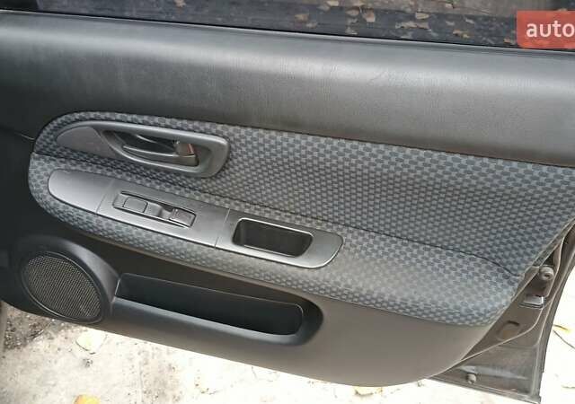 Черный Субару Импреза, объемом двигателя 1.5 л и пробегом 219 тыс. км за 4500 $, фото 14 на Automoto.ua