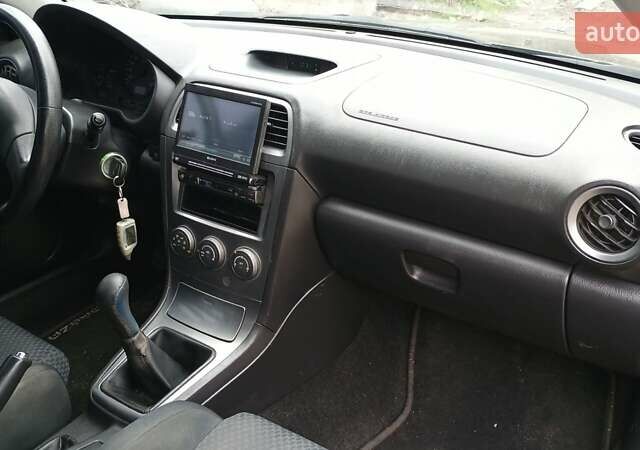 Черный Субару Импреза, объемом двигателя 1.5 л и пробегом 219 тыс. км за 4500 $, фото 10 на Automoto.ua