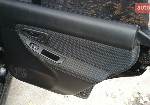 Черный Субару Импреза, объемом двигателя 1.5 л и пробегом 219 тыс. км за 4500 $, фото 16 на Automoto.ua