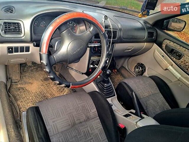 Красный Субару Импреза, объемом двигателя 1.6 л и пробегом 150 тыс. км за 2600 $, фото 4 на Automoto.ua